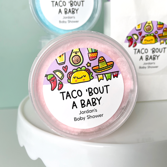 round baby shower stickers that read taco bout a baby on cotton candy favors