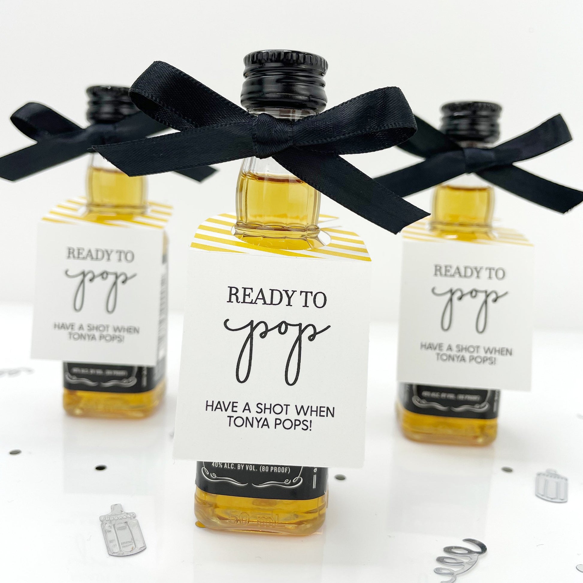 Ready to pop tags for miniature alcohol favors