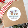 reindeer family Christmas gift labels attached to holiday gift