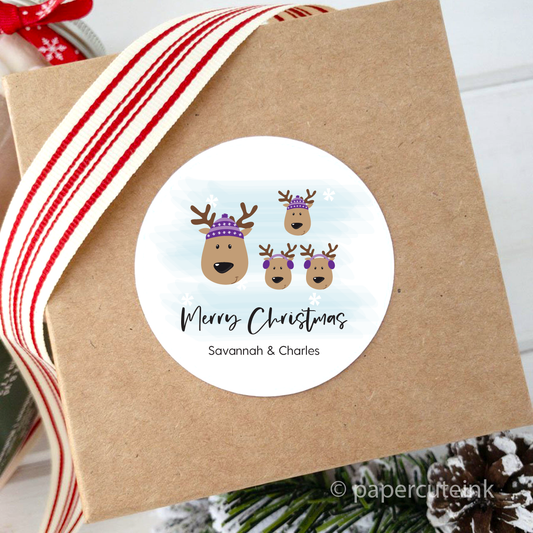 reindeer family Christmas gift labels attached to holiday gift