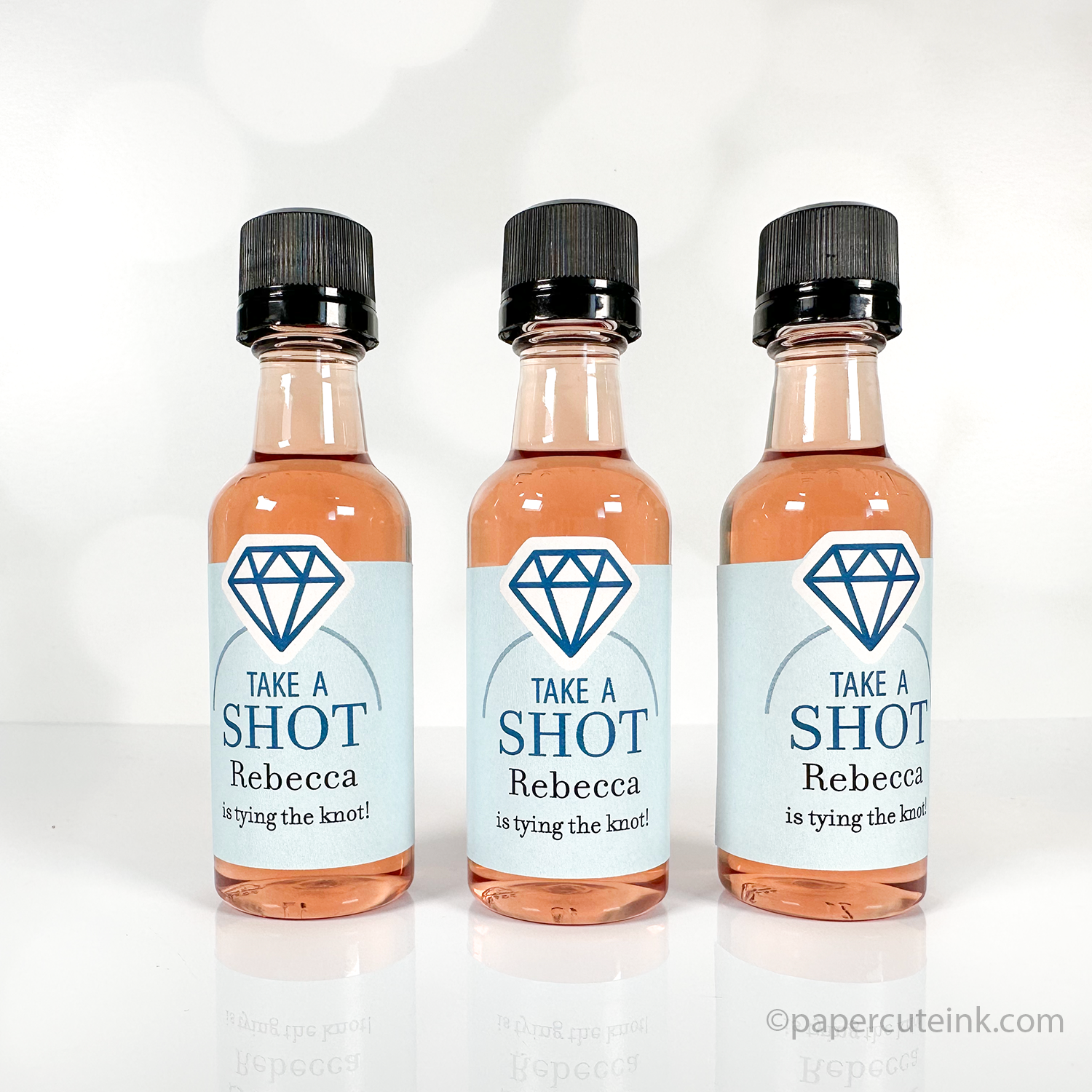 take a shot shes tying the knot engagement liquor bottle favors