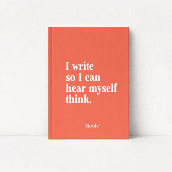 A coral orange hardcover book standing upright against a white background. The front cover features the white serif text 'I write so I can hear myself think.