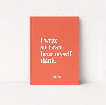 A coral orange hardcover book standing upright against a white background. The front cover features the white serif text 'I write so I can hear myself think.