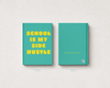 A teal planner or notebook shown from the front and back on a light textured background. The front cover has large yellow text reading “SCHOOL IS MY SIDE HUSTLE,” and the back cover is mostly plain teal with small yellow text and a small square logo near the lower right.
