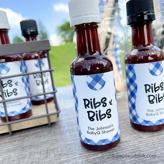 barbecue baby shower favors on a picnic table