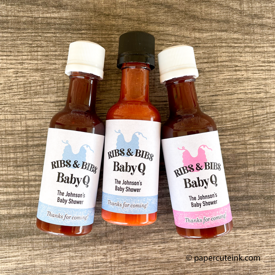 baby shower favors miniature bottles of barbecue sauce and hot sauce