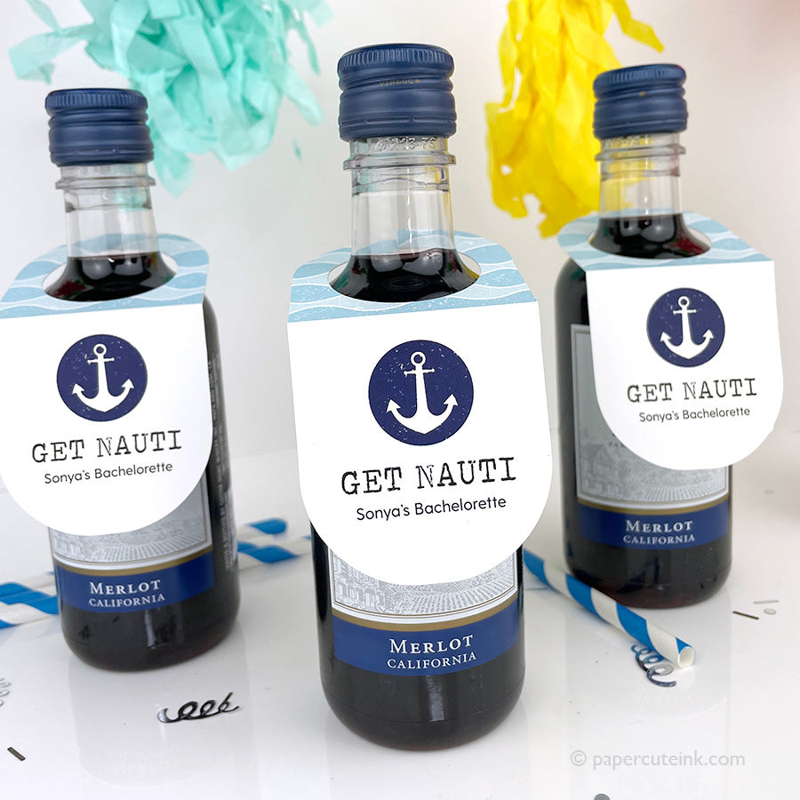 Party favor Get Nauti bottle tags attached to mini bottles of wine