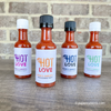 wedding favors miniature bottles of hot sauce that read hot love